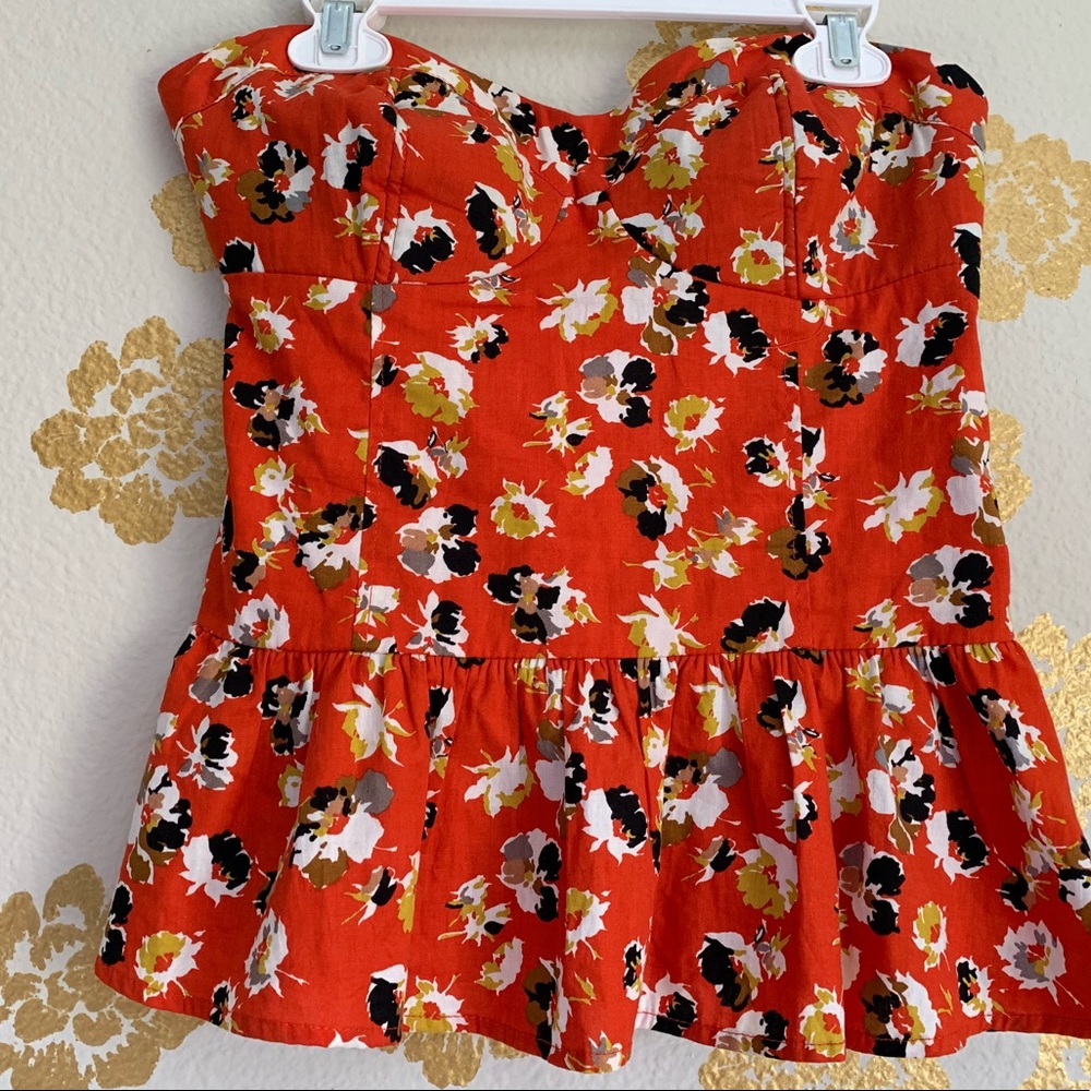 Orange top with floral print